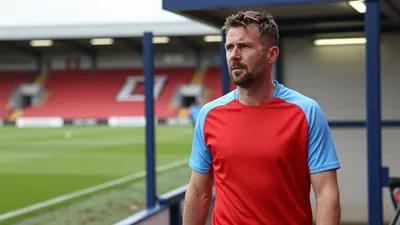 A 35-year-old, ruggedly-built Derry City assistant coach, with a mix of determination and concern etched on his face...